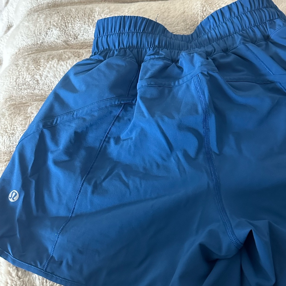 Like new Lululemon size 4 track shorts